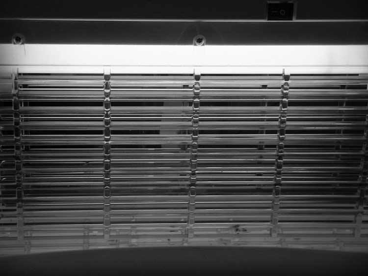 Bug zapper with horizontal tubes