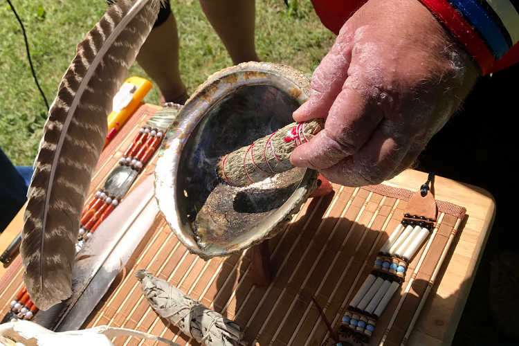 Purifying smoke at a naming ceremony